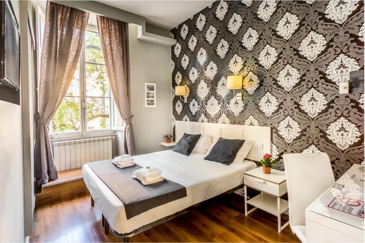 อโมโรมา สวีท Bed & Breakfast ภายนอก รูปภาพ